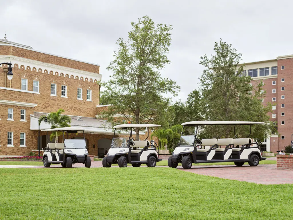 Toro Vista Passenger Transport 4 seater, 6 seater and 8 seater models in a university courtyard