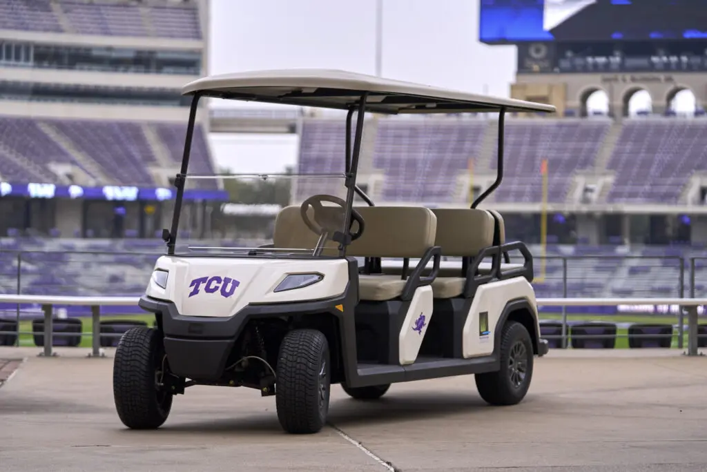 A Toro Vista Passenger Transport Vehicle parked in a sports stadium of Texas Christian University