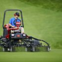 Greenkeeper mowing fairway with Reelmaster 3575