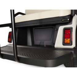 Close-up of the Toro Vista PTV’s closed rear compartment panel, featuring a beige seat and textured rear step platform