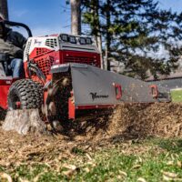 Ventrac 22" Stump Grinder Tractor Attachment - cutting through stumos