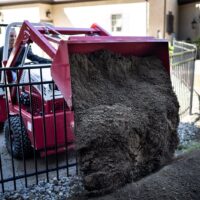 Ventrac Versa Loader Attachment - dumping dug ground