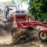 Ventrac 49" Landscape Rake Tractor Attachment - raking residential grounds