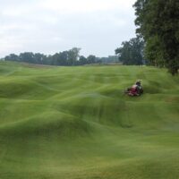 Ventrac Triplex Reel Mower Attachment - mowing golf grounds (slope)