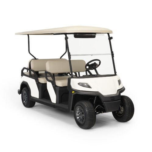 Toro Vista PTV EFI 6-seater gas golf cart with beige seats and roof, black handrails, and a white exterior, captured in a front three-quarter view