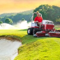 Ventrac Triplex Reel Mower Attachment - mowing by golf hole