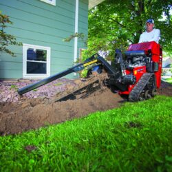 Trencher being used in backyard