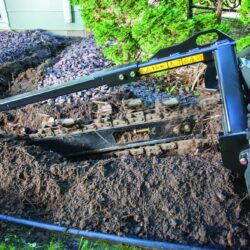 Trencher in soil